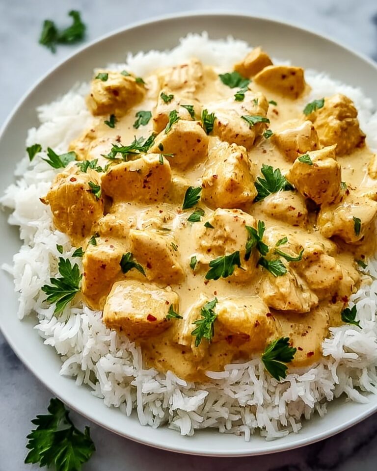 Irresistibly Creamy Smothered Chicken and Rice Recipe