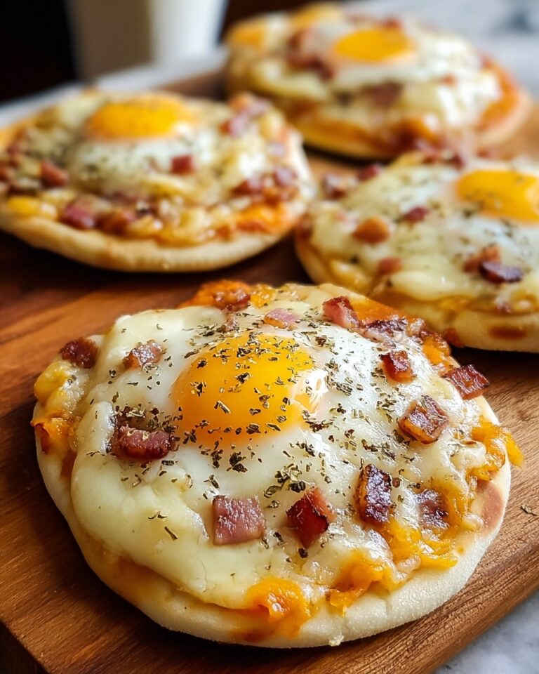 English Muffin Breakfast Pizza with Sausage, Eggs, and Cheddar Recipe